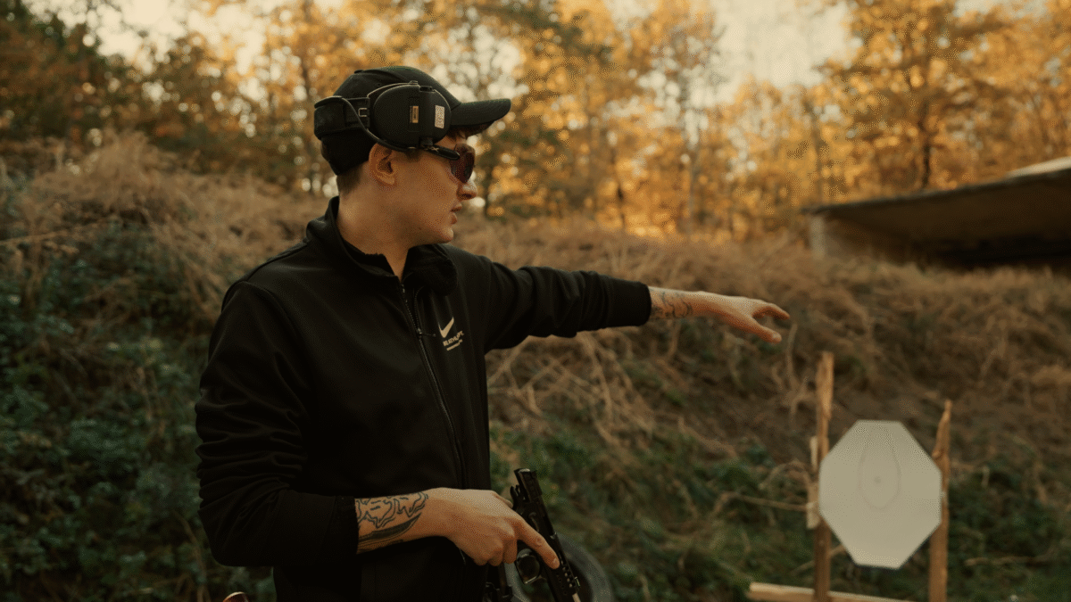shooter pointing on targets on the range